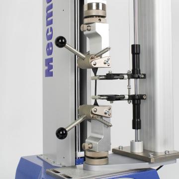 ttm_multitest_2.5-dv_ELS-with_extensometer_rubber-dumbell-tensile.jpg ttm_multitest_2.5-dv_ELS-with_extensometer_rubber-dumbell-tensile